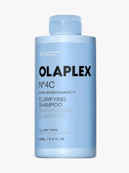 Olaplex No. 4C Bond Maintenance Clarifying Shampoo in branded component on a light gray background