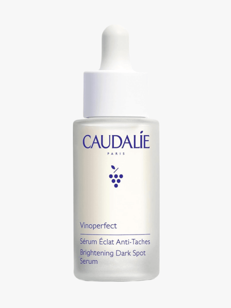 Caudalie Vinoperfect Brightening Dark Spot Serum in branded dropper component on a light gray background